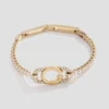 Bracelet tennis Signature doré