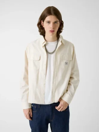 Chemise courte ajustée avec poches