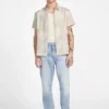 Chemise en tissu flammé avec motif de palmiers