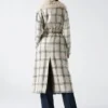 Manteau cache-cœur à carreaux et paillettes Charlize Manteau cache-cœur à carreaux et paillettes Charlize