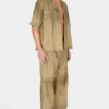 Pantalon ample en daim avec boutons-pression Pantalon ample en daim avec boutons-pression