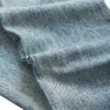 Pantalon en denim taille basse à œillets