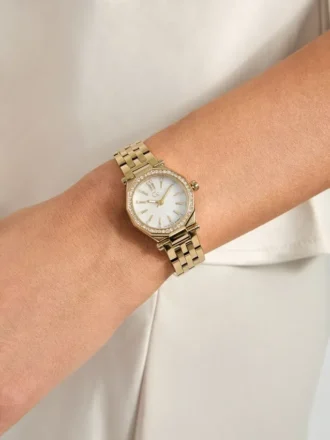Petite montre analogique dorée Gc