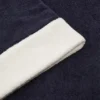 Serviette à bordure bicolore
